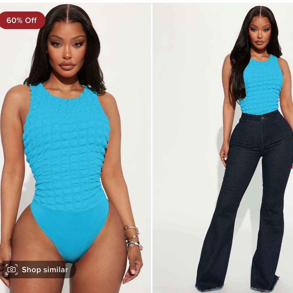Cute bodysuit. Never worn. New with tags. Size medium. Aqua.